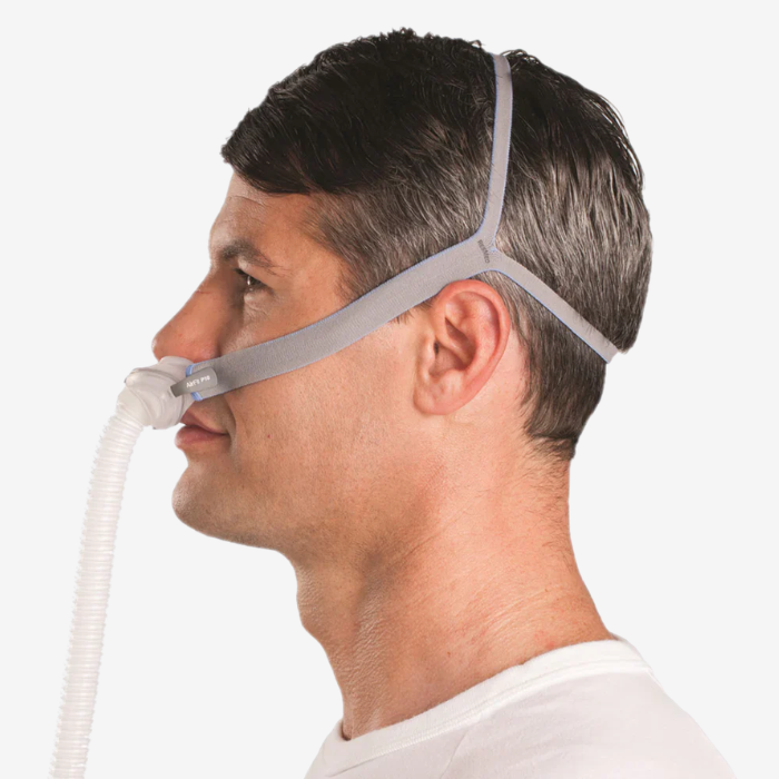 ResMed AirFit P10 nasal pillows mask system for CPAP sleep apnea treatment side view.