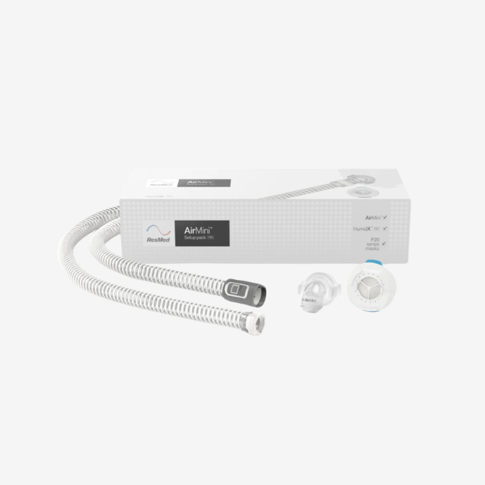 ResMed AirMini AutoSet CPAP machine with AirFit F20 mask for sleep apnea therapy.